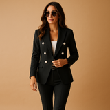 Stylish women's suit with blazer and trousers.