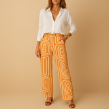 Timeless women's set with long-sleeved blouse and pants.
