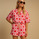 Two-piece summer suit with floral print and elastic waistband for women.