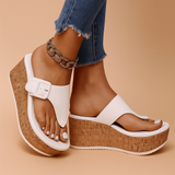 Raised comfort sandals with high soles for women.