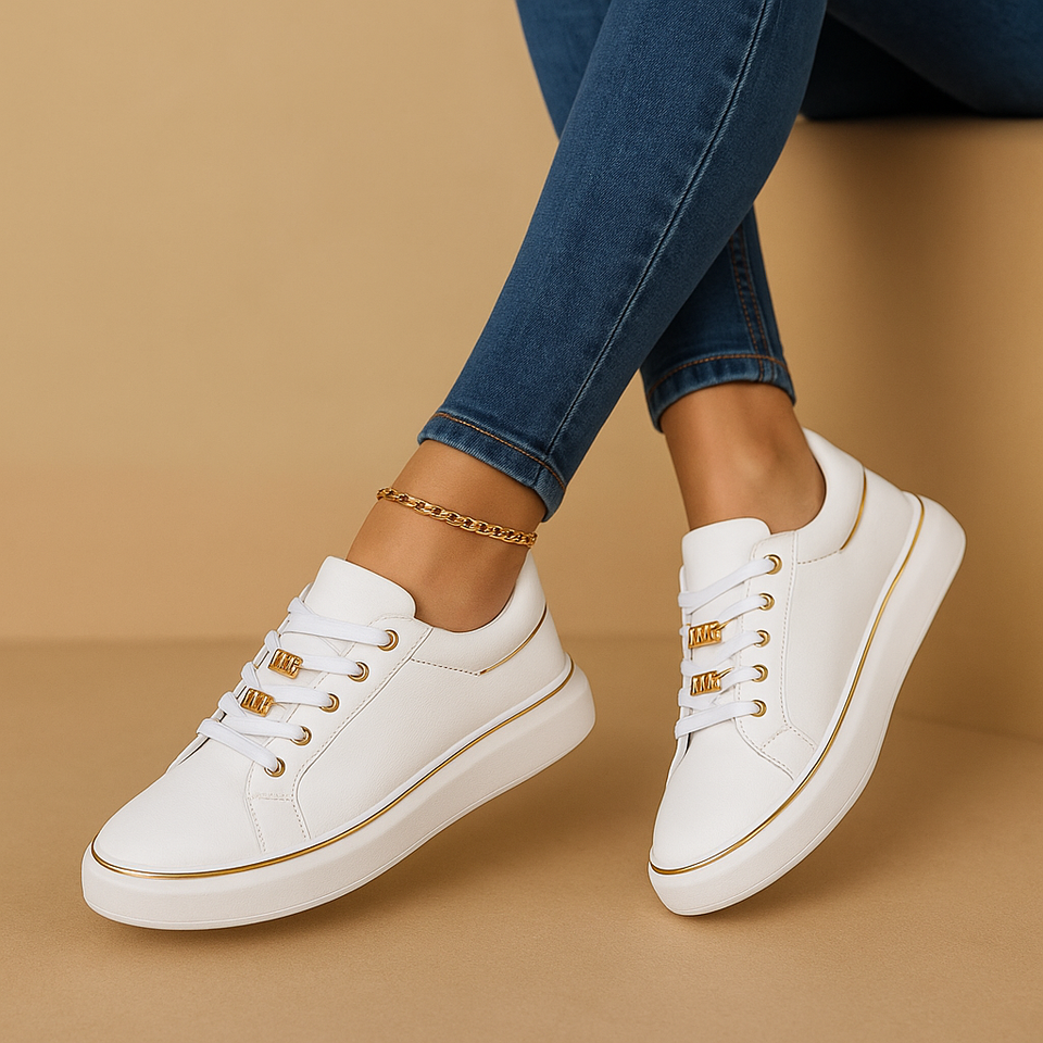 White sneakers with gold detailing for women
