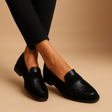 Black festive slip-ons for women.