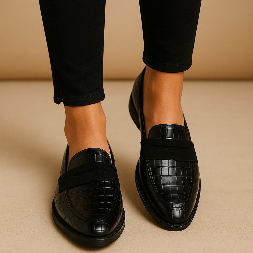 Black festive slip-ons for women.